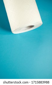 Toilet Paper Top View. Paper Towel Roll On The Blue Background. Hygiene Stuff For Everyday. Banner Template With Body Care Products And Copy Space. Selective Focus