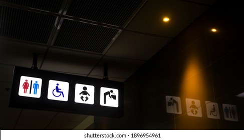 Toilets And Multi Faith Room Sign At Entrance Modern Airport Building Terminal