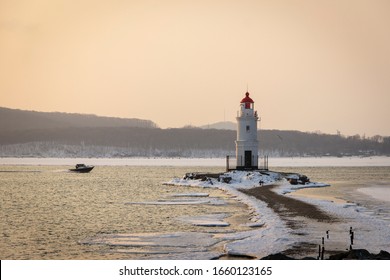 Tokarevsky Lighthouse In Vladivostok At Dawn On A Winter Morning.