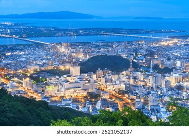 Tokushima, Japan downtown city skyline at blue hour from the mountains. - Powered by Shutterstock