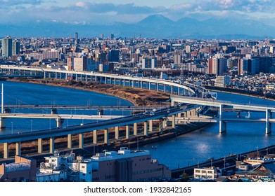 Tokyo Aerial View With River Side Landscape And Highway Curved Path 