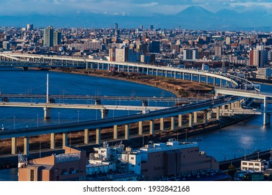 Tokyo Aerial View With River Side Landscape And Highway Curved Path 