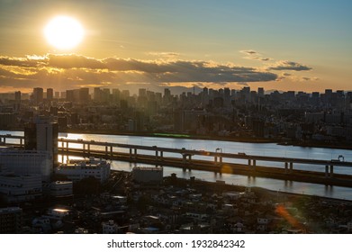 Tokyo Aerial View With River Side Landscape And Highway Curved Path On Sunset Time