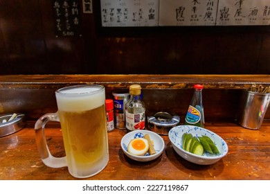 Tokyo, APR 5 2013 - Close Up Shot Of Japanese Style Cold Beer, Tamago And Appetizer