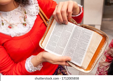 TOKYO - APRIL 21, 2010: Jehovah's Witness Holding Open Passages From The Bible