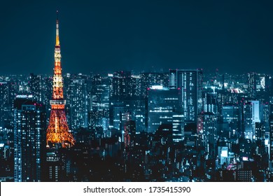 Tokyo city skyline view and office business building skyscraper downtown center with Tokyo Tower at evening in Japan. Asia tourism, modern city life, or business finance and economy concept - Powered by Shutterstock