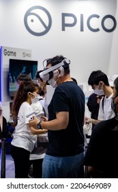 Tokyo Game Show, Chiba, Japan - September 18, 2022: People Playing With Virtual Reality Glasses