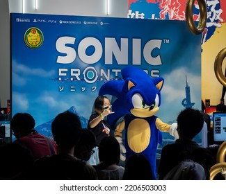 Tokyo Game Show, Chiba, Japan - September 18, 2022: A Girl Posing With Sonic From Sega