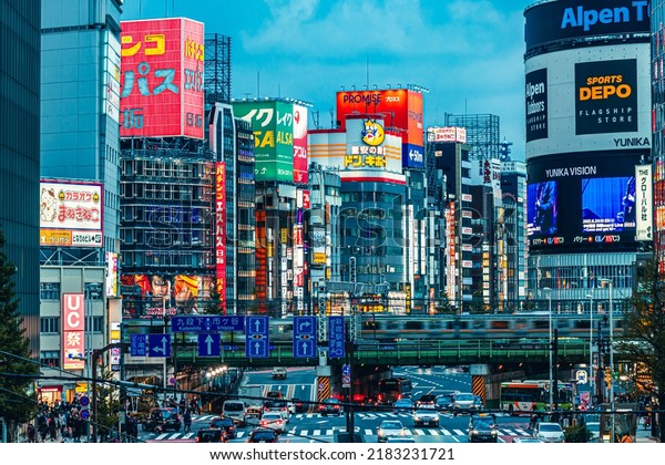 Tokyo, Japan -\
04.2022:  Japanese Neon Sign and Billboards in downtown Shinjuku\
City illumination during the night. Futuristic cyberpunk city and\
urban development\
concept.