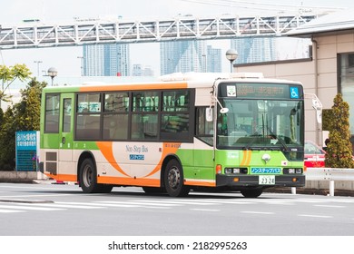 Tokyo, Japan - 04.2022: Japanese Toei Bus In Shinagawa City Stopping At Intersection While Carrying Commuters During Morning Rush Hour