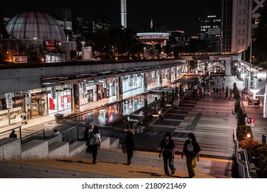 Tokyo, Japan - 05.2022: Tokyo Dome City Attractions Outdoor Shopping Plaza With Tourist And Shopper At Night