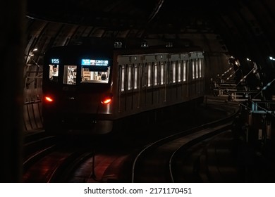 Tokyo, Japan - 06.2022: Metro Train On Tokyo Metro Fukutoshin Line Depart And Speed Through Underground Tunnel