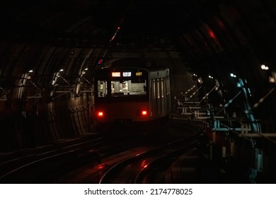 Tokyo, Japan - 06.2022: Metro Train On Tokyo Metro Fukutoshin Line Depart And Speed Through Underground Tunnel