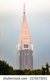 Tokyo, Japan - 06.2022: NTT Docomo Yoyogi Building Photographed From Harajuku. NTT Docomo Is The Biggest Mobile Network Operator In Japan Providing 3G, LTE And 5G New Radio (NR) Service