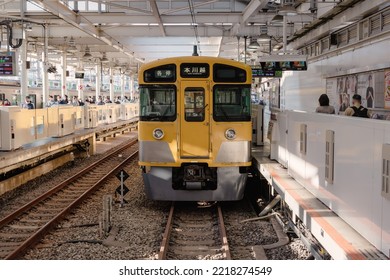 Tokyo, Japan - 09.2022: Seibu Shinjuku Vintage Yellow Electric Train Waiting For Passenger At Seibu Shinjuku Station