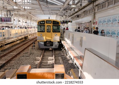 Tokyo, Japan - 09.2022: Seibu Shinjuku Vintage Yellow Electric Train Waiting For Passenger At Seibu Shinjuku Station