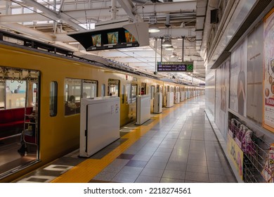 Tokyo, Japan - 09.2022: Seibu Shinjuku Vintage Yellow Electric Train Waiting For Passenger At Seibu Shinjuku Station