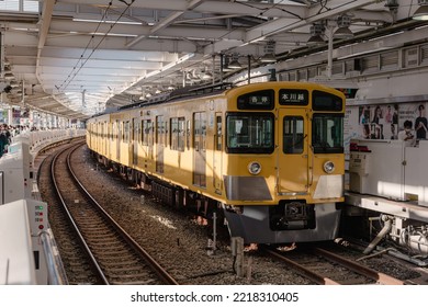 Tokyo, Japan - 09.2022: Seibu Shinjuku Vintage Yellow Electric Train Waiting For Passenger At Seibu Shinjuku Station