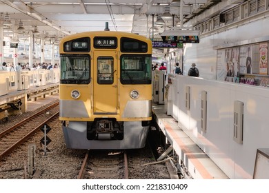 Tokyo, Japan - 09.2022: Seibu Shinjuku Vintage Yellow Electric Train Waiting For Passenger At Seibu Shinjuku Station