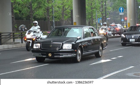 TOKYO,  JAPAN - 1 MAY 2019 : Japan's New Emperor Naruhito And New Empress Masako On The Vehicle Near The Imperial Palace In Tokyo. First Day Of Reiwa Era.