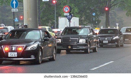 TOKYO,  JAPAN - 1 MAY 2019 : Japan's New Emperor Naruhito And New Empress Masako On The Vehicle Near The Imperial Palace In Tokyo. First Day Of Reiwa Era.