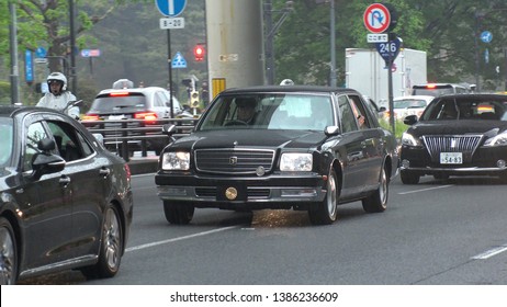 TOKYO,  JAPAN - 1 MAY 2019 : Japan's New Emperor Naruhito And New Empress Masako On The Vehicle Near The Imperial Palace In Tokyo. First Day Of Reiwa Era.