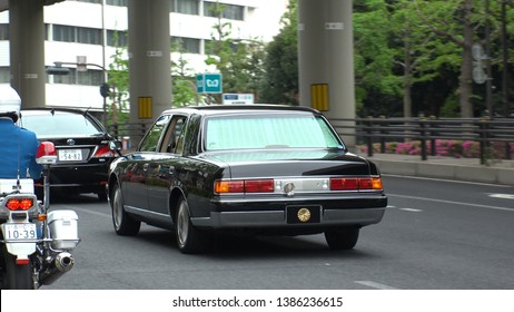 TOKYO,  JAPAN - 1 MAY 2019 : Japan's New Emperor Naruhito And New Empress Masako On The Vehicle Near The Imperial Palace In Tokyo. First Day Of Reiwa Era.