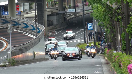 TOKYO,  JAPAN - 1 MAY 2019 : Motorcade Transporting Japan's New Emperor Naruhito And New Empress Masako Near The Imperial Palace In Tokyo. First Day Of Reiwa Era.