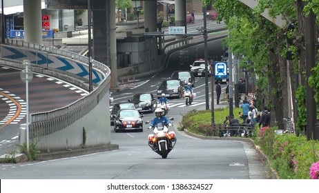 TOKYO,  JAPAN - 1 MAY 2019 : Motorcade Transporting Japan's New Emperor Naruhito And New Empress Masako Near The Imperial Palace In Tokyo. First Day Of Reiwa Era.