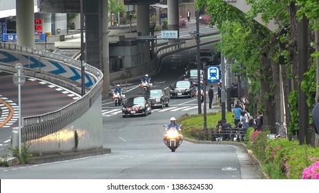 TOKYO,  JAPAN - 1 MAY 2019 : Motorcade Transporting Japan's New Emperor Naruhito And New Empress Masako Near The Imperial Palace In Tokyo. First Day Of Reiwa Era.