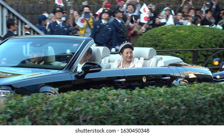 TOKYO, JAPAN - 10 NOVEMBER 2019 : Japan's Emperor Naruhito And Empress Masako On The Vehicle At The Royal Parade To Mark The Enthronement Of Emperor Naruhito.