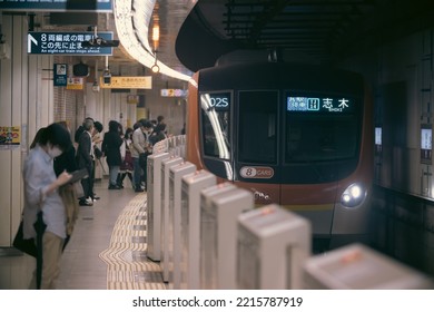 Tokyo, Japan - 10.2022: Crowd Of Commuters And Passengers Waiting For Metro Train On Fukutoshin Line At Ikebukuro Station During Evening Rush Hour