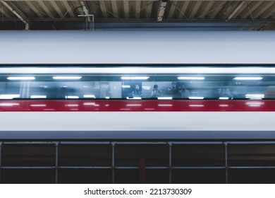 Tokyo, Japan - 10.2022: Express Train Passing Through Platform At Shinjuku Station.