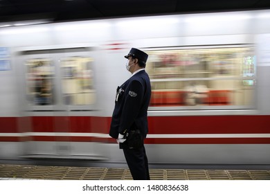 Tokyo, JAPAN - 11 November 2016: Train Conductor In Tokyo Subway. 