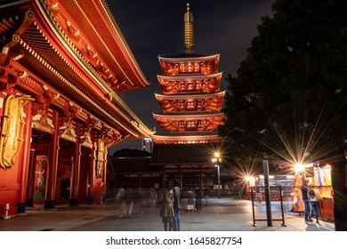Tokyo, Japan - 15th February, 2020: Sensō-ji  temple - The Hazomon and the five stories pagoda. Long exposure at night.