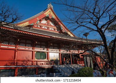 Tokyo, Japan - 18th February, 2020: Sensō-ji temple (Hondo).  View from a lateral garden with people.