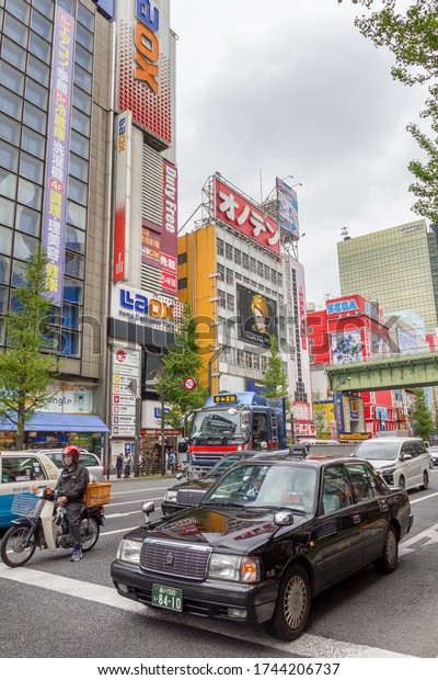 Tokyo, Japan - 21 April, 2019: People walking in\
the Akihabara area. The place is famous for recreating an\
atmosphere of game and anime\
worlds.