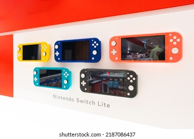 TOKYO, JAPAN - 25 June 2022：Nintendo Switch Lite Game Machine