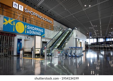 Tokyo, Japan 8 April 2021: View Of A Shopping  Dining Airport Mall Signage At Terminal One Narita Airport The Impact Of COVID-19