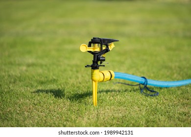 TOKYO, JAPAN - 9 June 2021：Sprinkler Installed On The Lawn