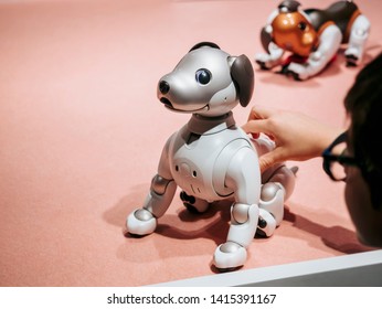 TOKYO, JAPAN - APR 14, 2019 : Aibo Robotic pets designed and manufactured by Sony Humanoid robot interaction with people - Shutterstock ID 1415391167