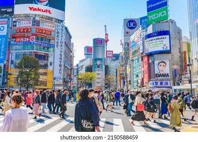 TOKYO, JAPAN - APR 8, 2022:  View of Shibuya Crossing, one of the busiest crosswalks in the world.
