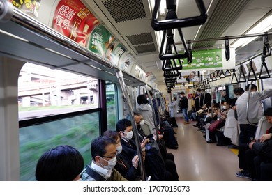 Tokyo, Japan - April 15 : Rush Our Train In Tokyo Japan Less Crowded, And All Windows Train Are Open During State Of Emergency Due To Spread Of Coronavirus 