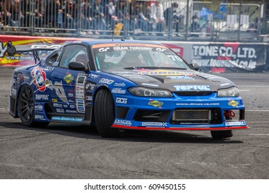 Tokyo, Japan - April 18, 2015: Masashi Yokoi Of D-MAX, Performs Drifting During The Round 1 Of D1 Grand Prix At Odaba Special Course.