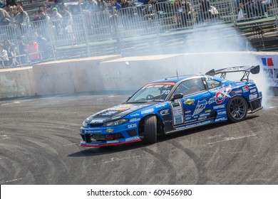 Tokyo, Japan - April 18, 2015: Masashi Yokoi Of D-MAX, Performs Drifting During The Round 1 Of D1 Grand Prix At Odaba Special Course.