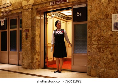 TOKYO, JAPAN - April 20, 2017: An Elevator Operator Working In Takashimaya Department Store In Nihonbashi.