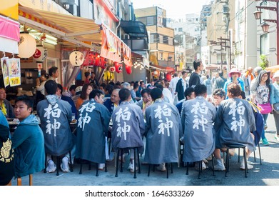 Tokyo, Japan - April 2014:
People Eating At Hawker Stand.