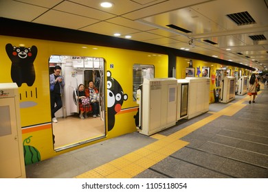 Tokyo, Japan - April 21, 2018: Beautiful Kumamon (the Ginza Line In Tokyo) Theme Train At The Station.