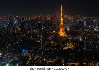 TOKYO, JAPAN- APRIL 21,2018 :The Lights Of Tokyo Tower Shine Out From The Body Of The Tower,Tokyo City Night View From Observation Deck Located At The Mori Tower,in The Roppongi Hills.Minato.Japan.