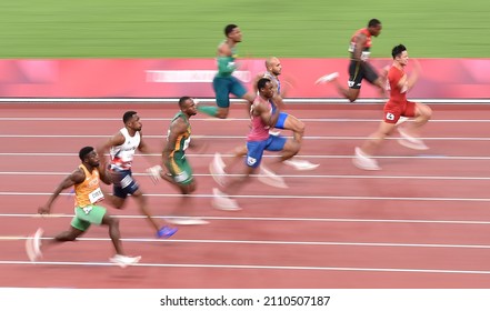 TOKYO, JAPAN - AUGUST 1, 2021: Athletics 100m men's race during the Tokyo 2020 Olympic Games.